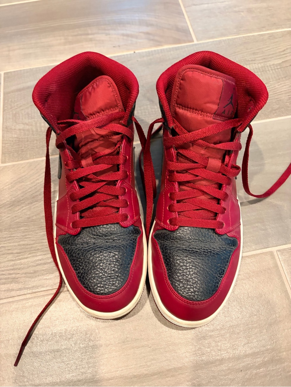 Nike Jordan Red and Black Mid-Top Sneakers